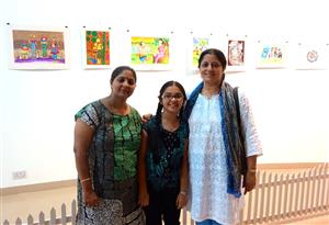 Chitra Vaidya with student and parent